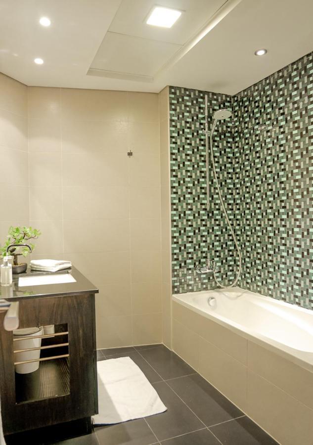Nasma Luxury Stays - Cayan Tower Dubai Exterior foto
