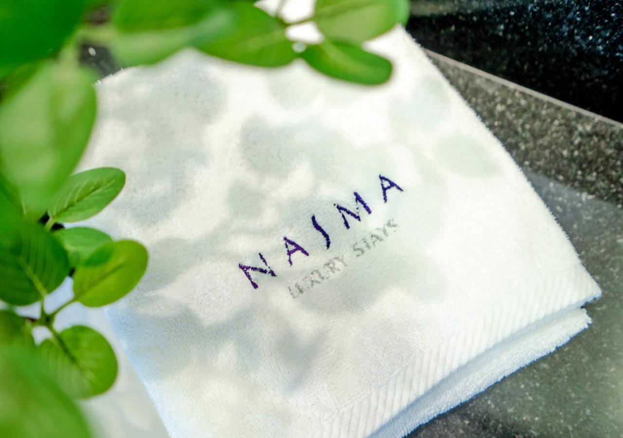 Nasma Luxury Stays - Cayan Tower Dubai Exterior foto